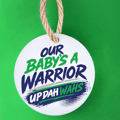 Our Baby's a Warrior UP DAH WAHS keepsake on a green background