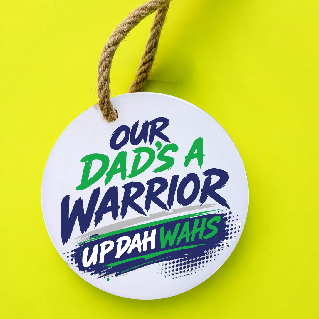 Our Dad's a Warrior UP DAH WAHS keepsake on a yellow background